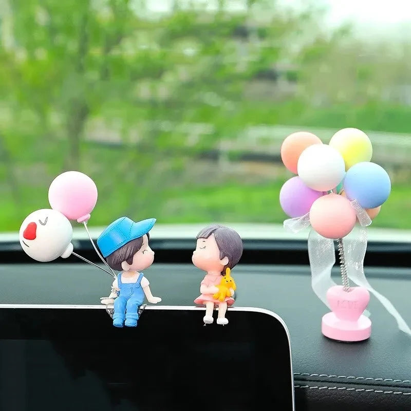 Couple Figurines with Balloons — Car Dashboard Decoration