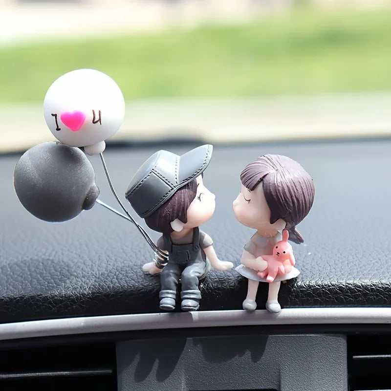 Couple Figurines with Balloons — Car Dashboard Decoration